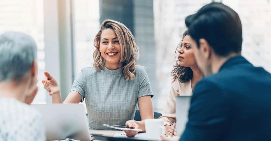 Businesswoman Leading A Meeting large 2560 x 1338 jpg