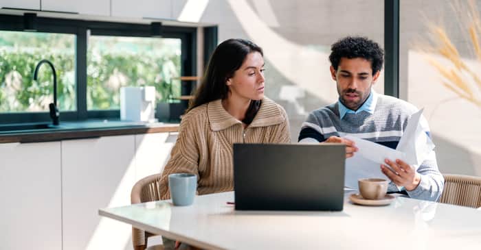 working at desk together 2560 x 1338 large
