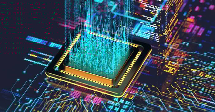 Digital rendering of a computer processor chip emitting colorful lines of energy