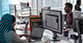 people in office working on computers svb chevron 83 x 43
