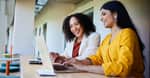women with laptop large promo 2560 x 1338