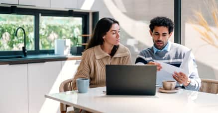 working at desk together 2560 x 1338 large