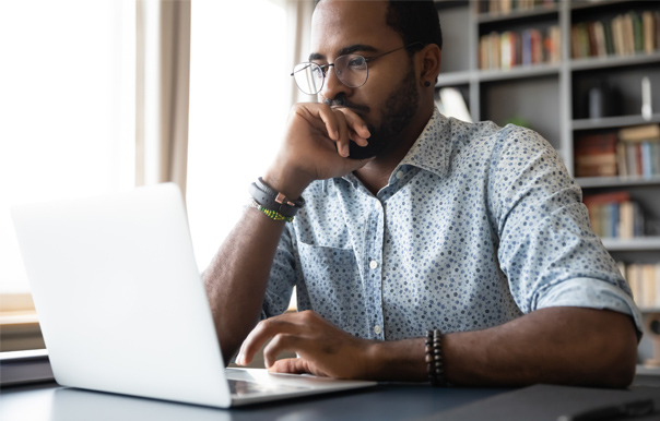 Man looking at laptop