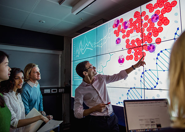 Group-of-Professionals-Reviewing-Data-604x431.jpg