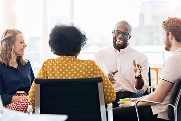 Business People Having Meeting 604 x 404. jpg