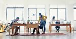 Creative Professionals Working In Office.560x292