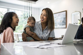 women with children laughing 1600x700