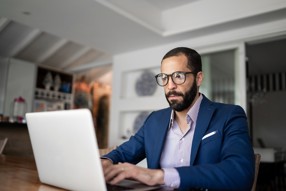 man working at laptop