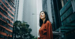 Low Angle Portrait Of Confident Businesswoman meta 1200x627